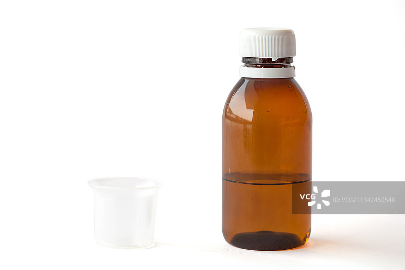 精油瓶白色背景特写图片素材