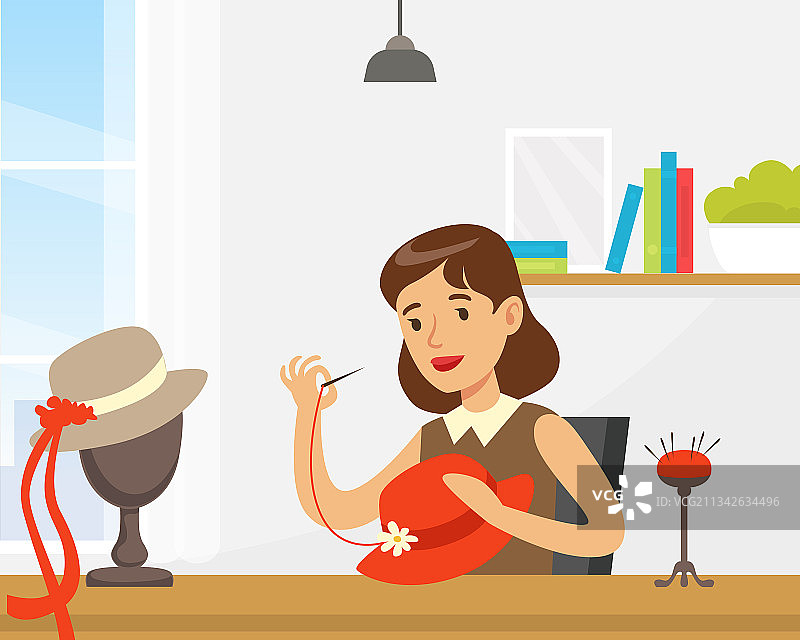 制作帽子的女设计师图片素材