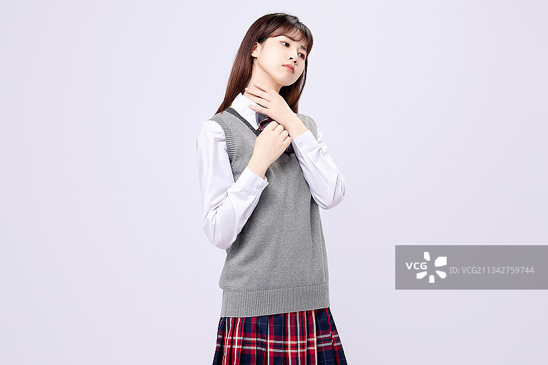 穿着中学校服的亚洲美女图片素材