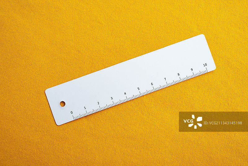 黄色纯棉针织面料和尺子图片素材
