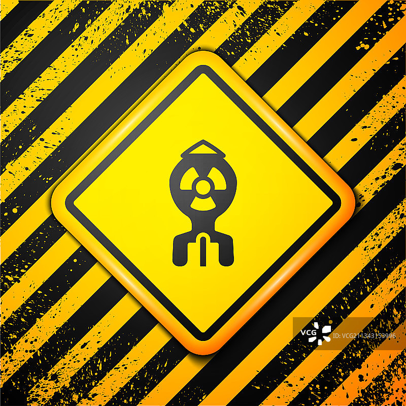 黄色背景上的黑色核弹图标图片素材