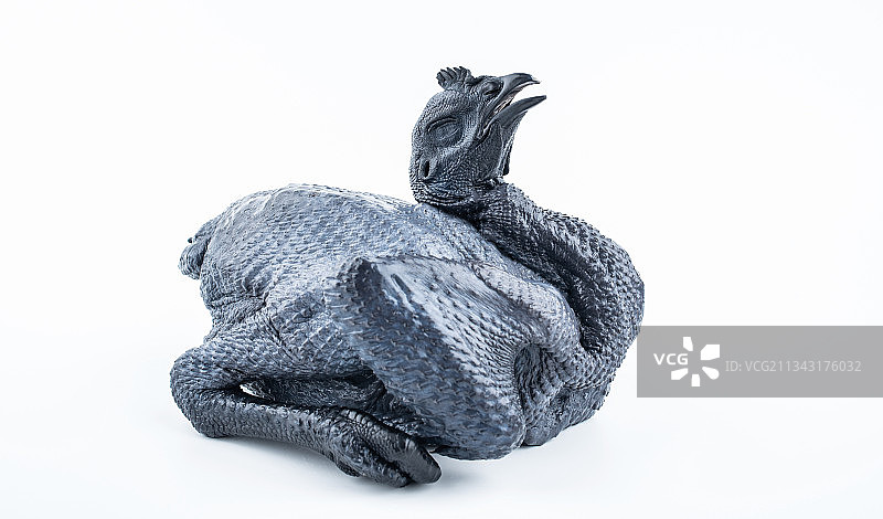 白背景上一只新鲜乌鸡图片素材