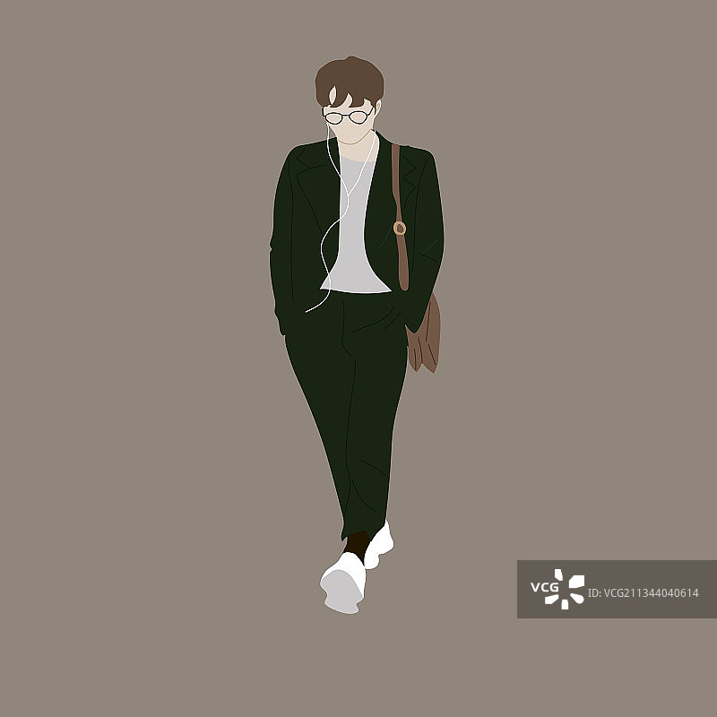 一个穿绿色西装，提着棕色袋子的男人图片素材