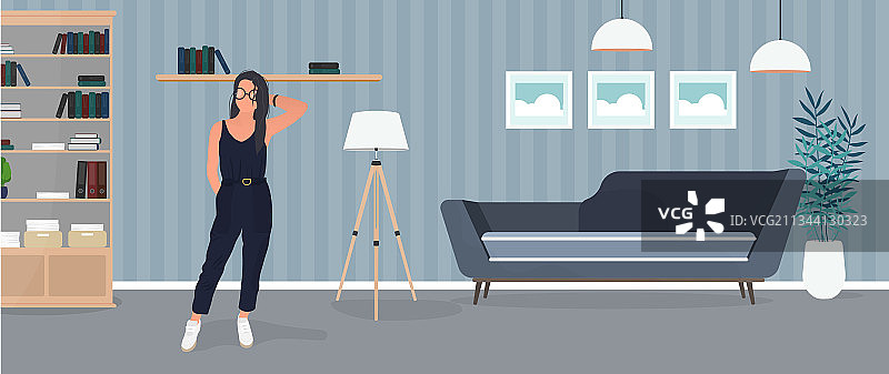 身穿时尚西装在房间里摆姿势的深色头发模特女孩图片素材