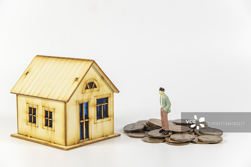 房子和贷币及人物图片素材