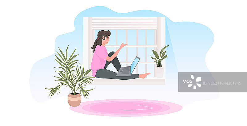 坐在窗台上用笔记本电脑自由职业的女人图片素材