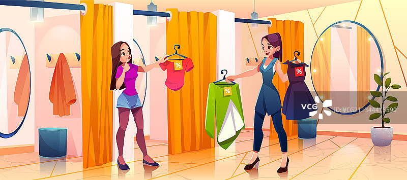 在商店试衣间试穿衣服的女人图片素材