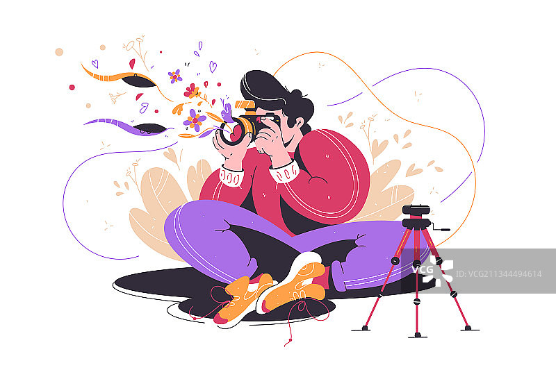 年轻男人透过镜头看光图片素材