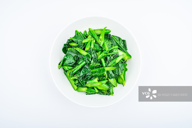 白背景上一碟炒芥蓝图片素材