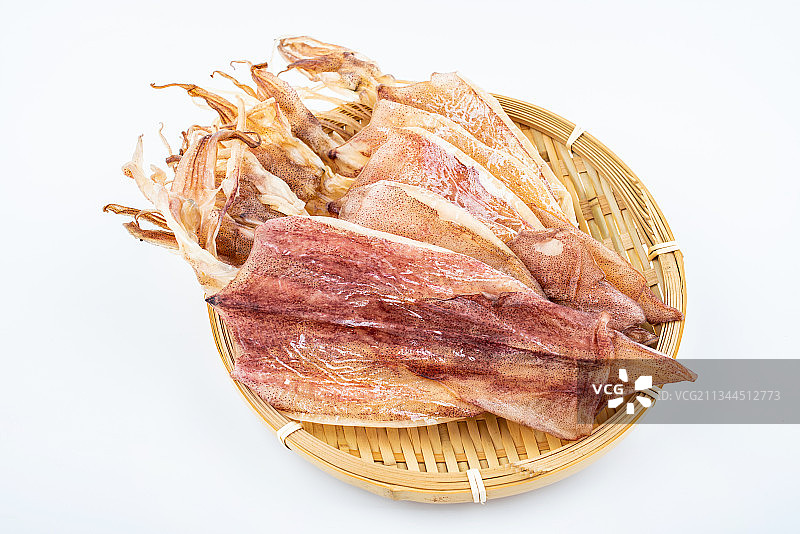 白背景上的淡晒鱿鱼干图片素材