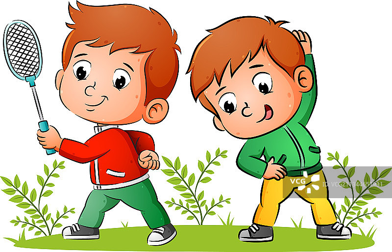 一对运动型男孩在打羽毛球图片素材