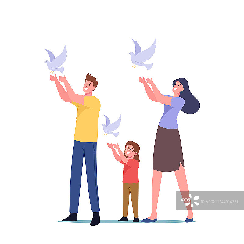 一家人放飞白色鸽子图片素材