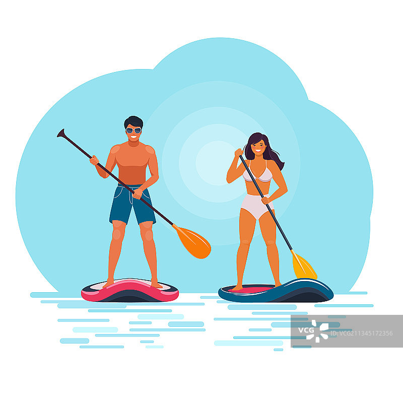 在立式桨板上的男女图片素材