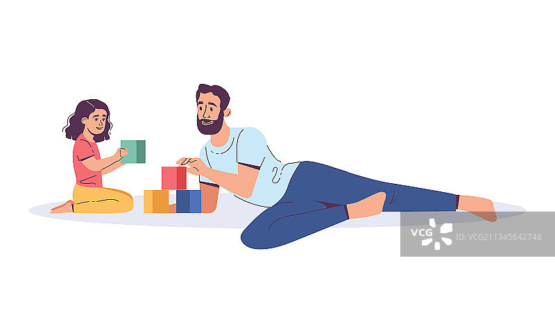 微笑的爸爸和女儿一起玩积木图片素材