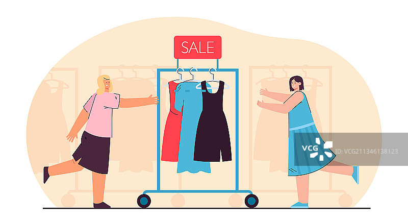 女售货员推着装满连衣裙的衣架图片素材