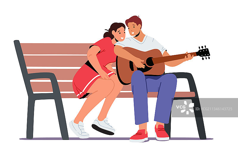 男人弹吉他唱歌给坐在地上的女人听图片素材