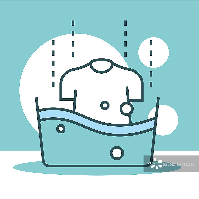 装有衬衫的洗衣盆图片素材