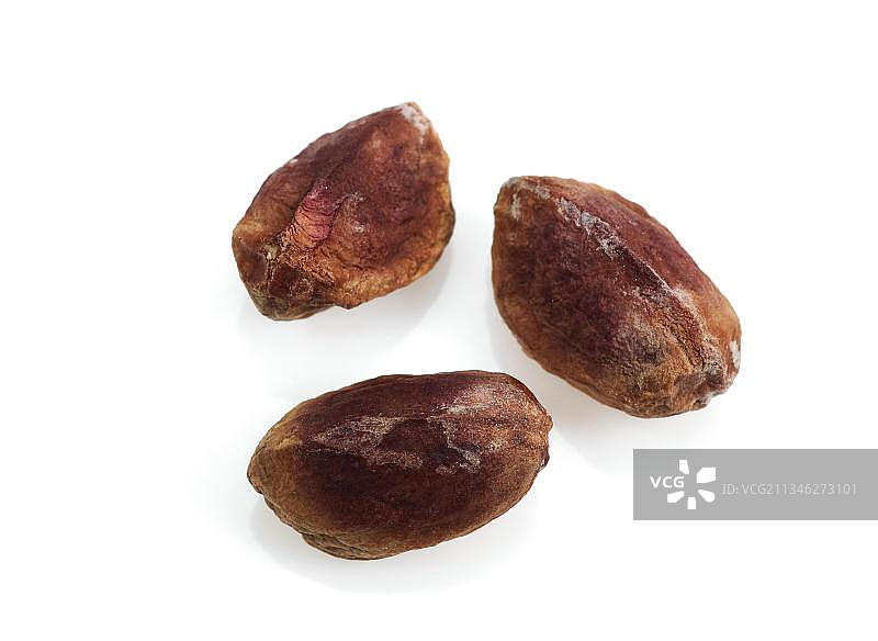 白色背景上的开心果干果图片素材