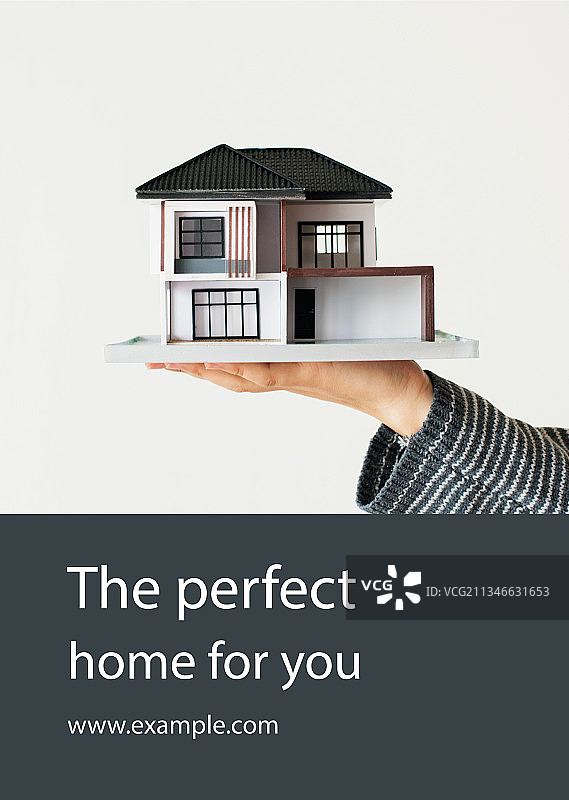 手持房屋模型的局部，白色背景图片素材