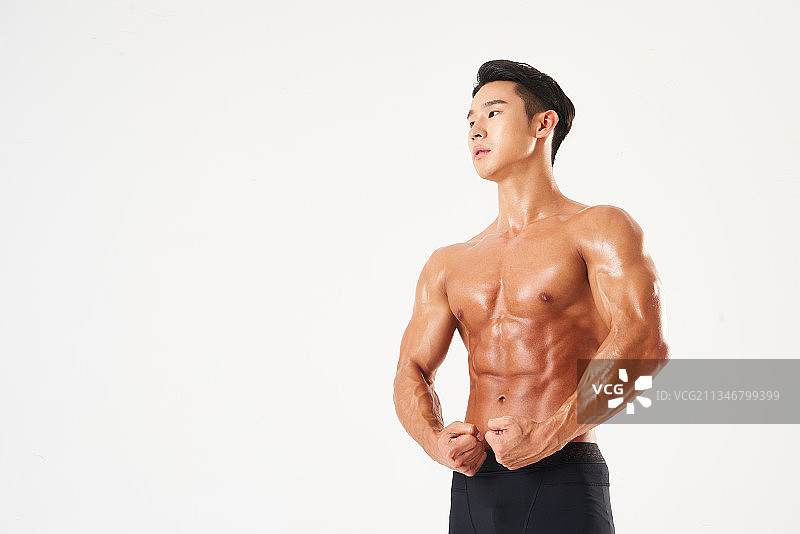 肌肉发达的男人，白色背景图片素材
