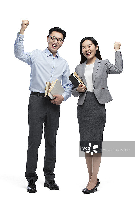 两位优秀的教师做加油鼓励手势图片素材