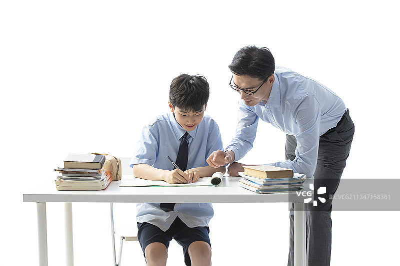 老师给学生辅导功课图片素材