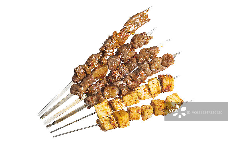 串在铁签子上的烤串图片素材