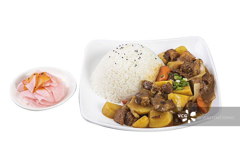 盘子里放着的土豆牛腩饭图片素材