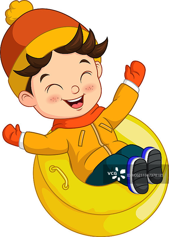 可爱的小男孩在山坡上滑雪图片素材