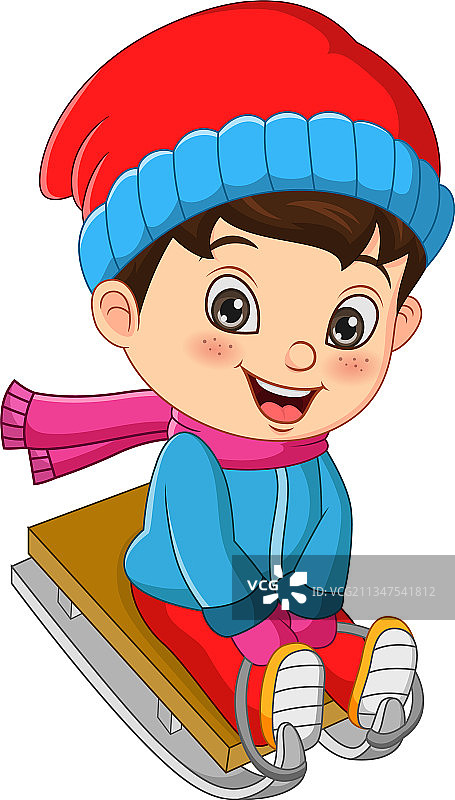 可爱的小男孩在山坡上滑雪图片素材