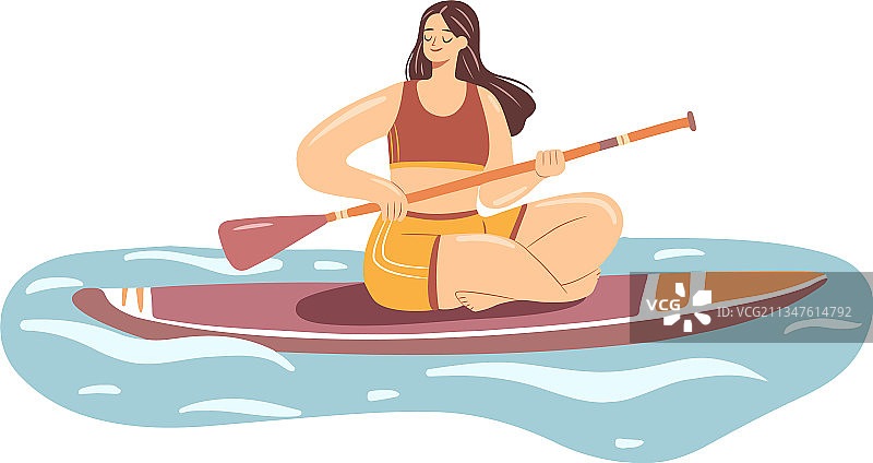 在冲浪板上穿泳衣的年轻女人图片素材