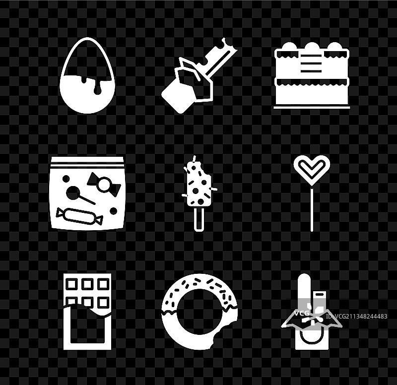 一组巧克力蛋、被咬的巧克力棒和蛋糕图片素材