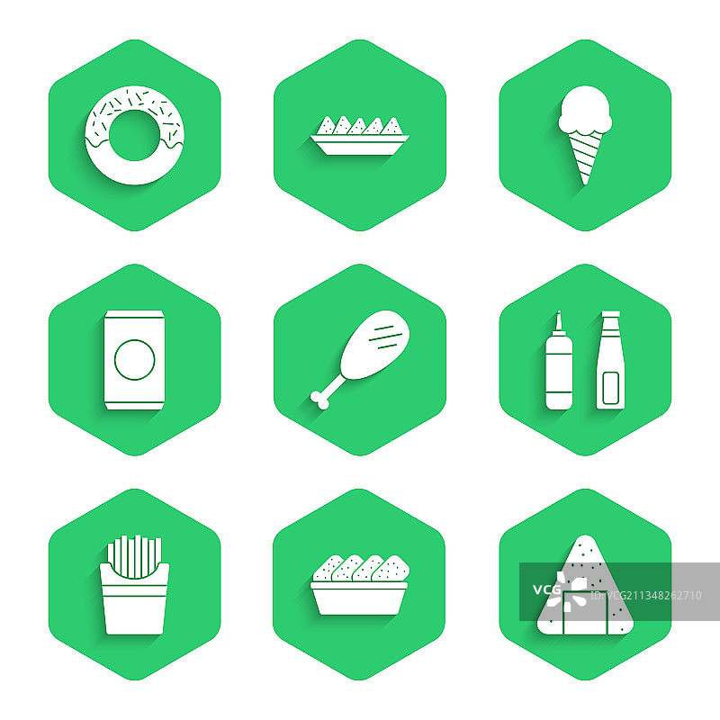 鸡腿、炸鸡块盒、饭团和酱汁图片素材