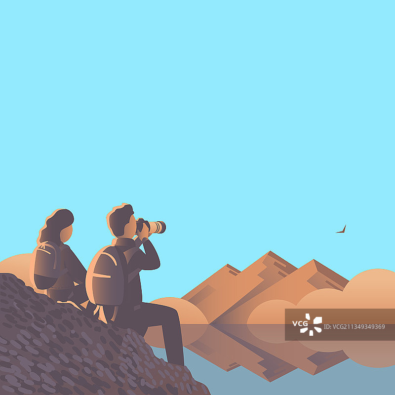 男女拿着相机坐着图片素材