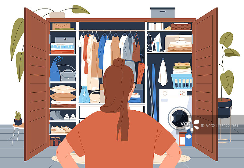 站在整洁衣柜前的女人图片素材