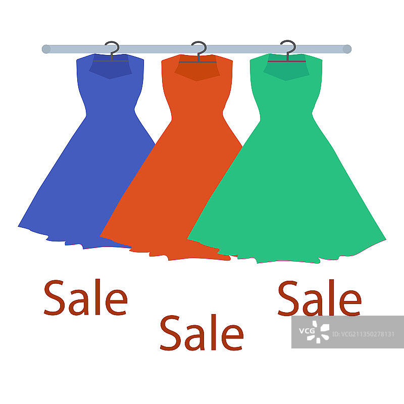 衣架上不同颜色的三件连衣裙图片素材