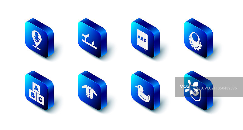 婴儿鞋、书籍和围兜套装图片素材