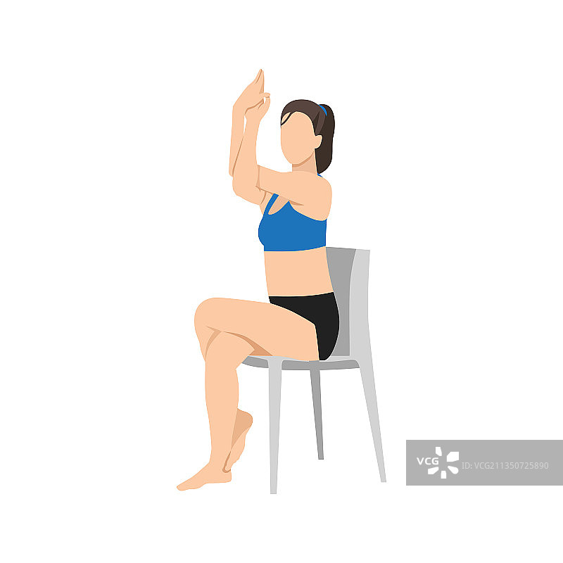 女人做椅子式鹰式瑜伽图片素材