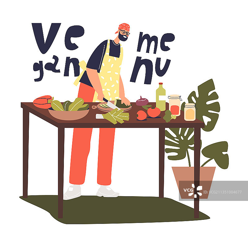 男厨师为餐厅制作纯素菜单图片素材