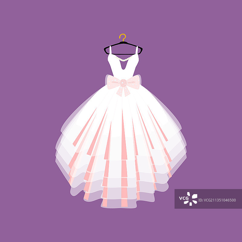 美丽的婚礼礼服挂在衣架上图片素材