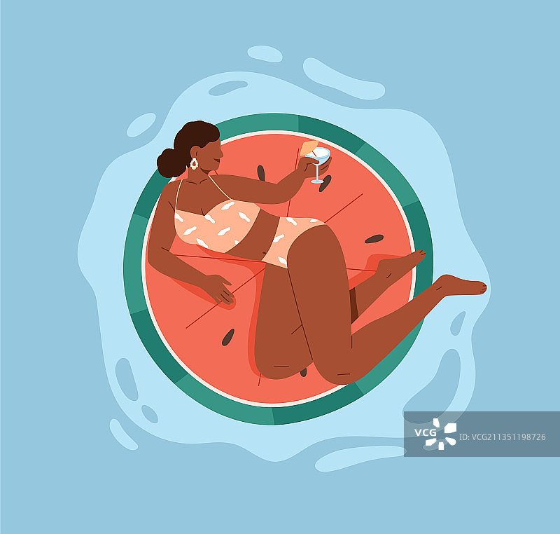 比基尼女人在泳池里漂浮在游泳圈上图片素材