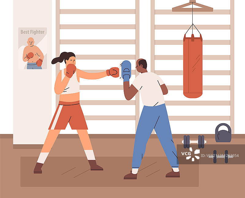 健身房内女子与教练进行拳击训练图片素材