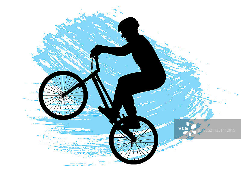 骑行者在自行车上表演特技图片素材