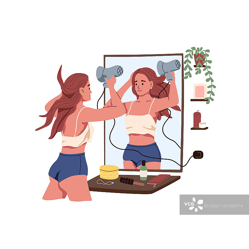 用吹风机做头发造型的年轻女人图片素材