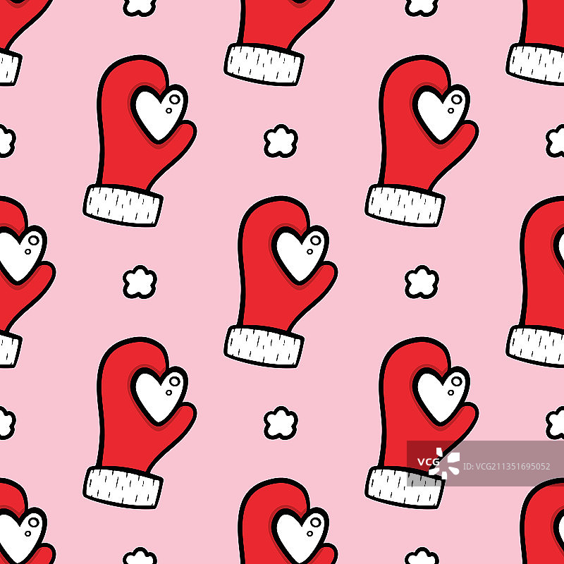 带有雪心圣诞图案的红色手套图片素材