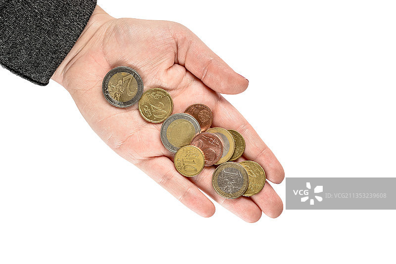 手持硬币，白色背景图片素材