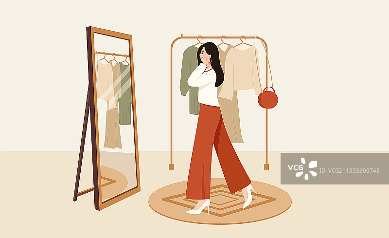 镜子前试衣服女人图片素材