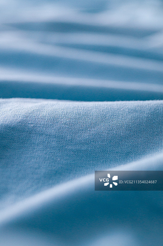 蓝色织物的全画幅镜头图片素材