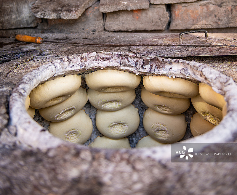 新疆馕饼制作图片素材