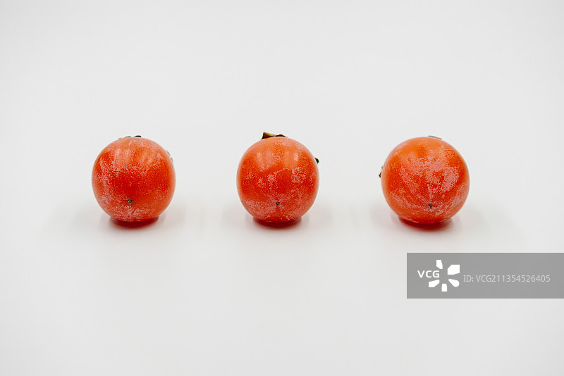 秋天绿色健康水果柿子图片素材